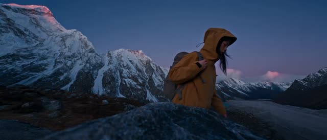 An expedition across a dramatic mountain landscape.
